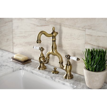 Kingston Brass Bridge Bathroom Faucet with Brass PopUp, Antique Brass KS7973PL